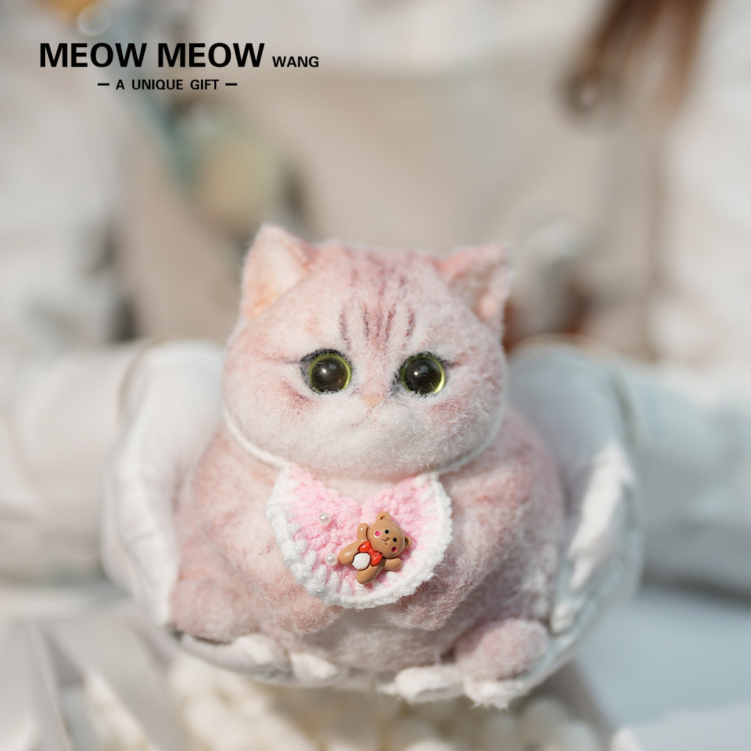 C24:A Pink Cat Wearing A Pink Bib