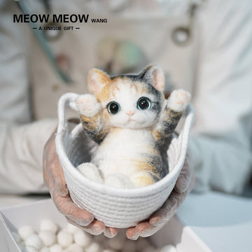 B18:The Calico kitten Curled Up In The Basket