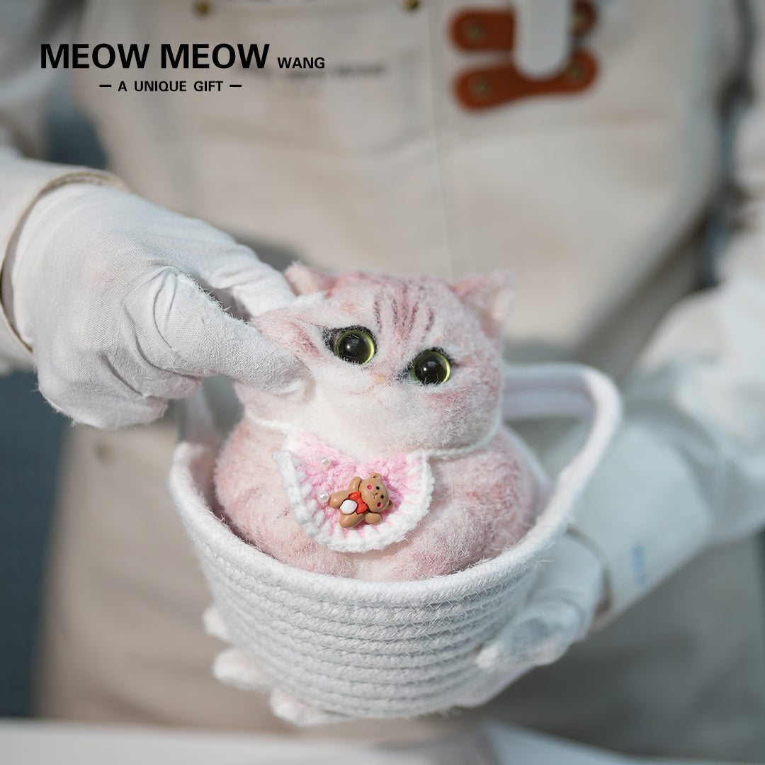 C24:A Pink Cat Wearing A Pink Bib