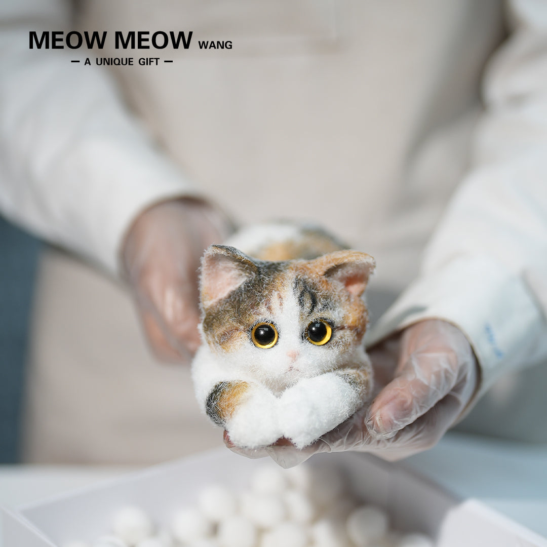 B25:A Crouching Calico Cat