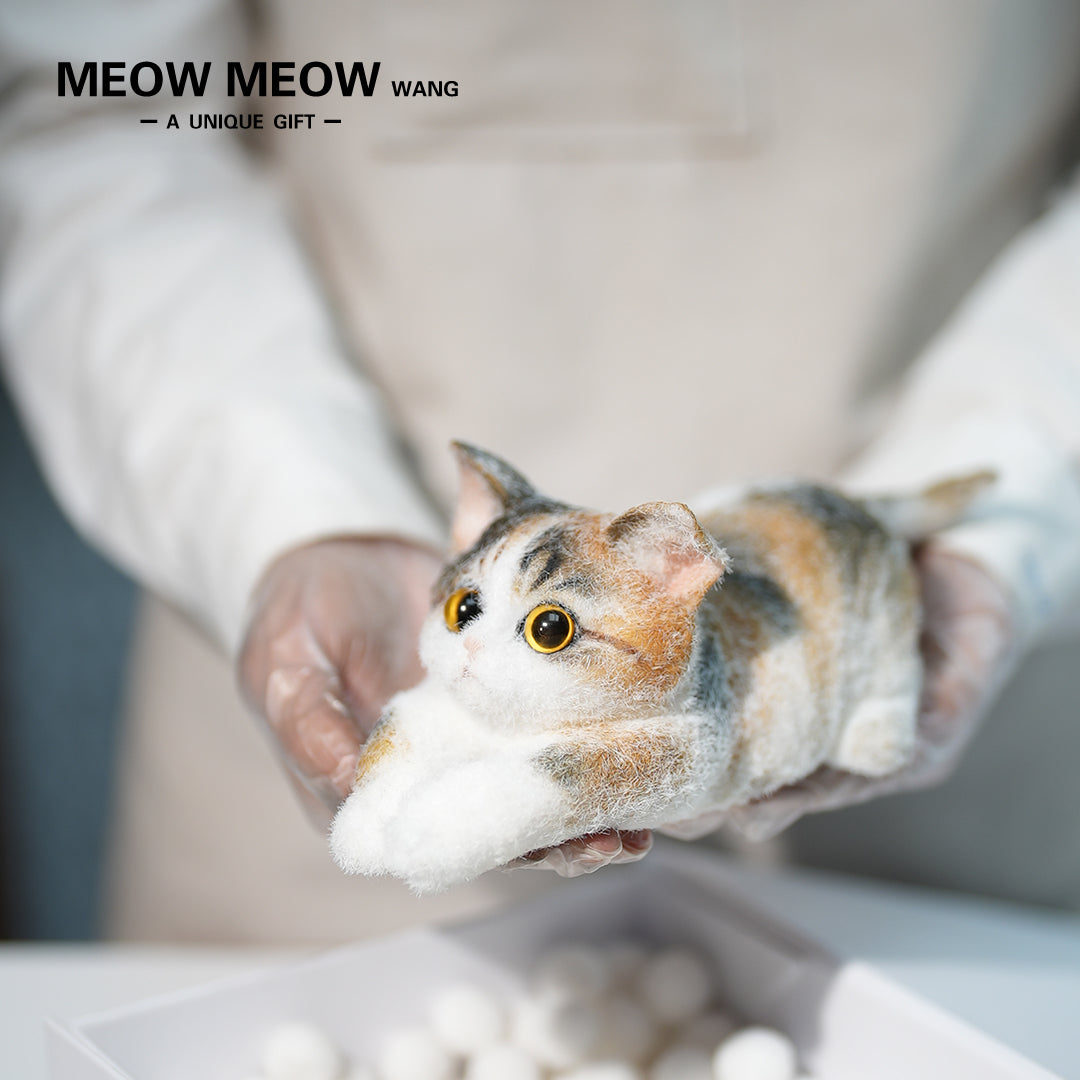 B25:A Crouching Calico Cat
